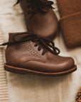 Dark brown leather boots for children. Unisex style.