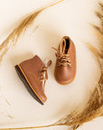Adelisa & Co Paseo leather boots for children in medium brown. These vintage style boots feature subtle handcrafted side detailing and come in a medium brown leather.