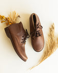 Dark brown leather boots for women.