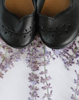 Adelisa & Co's handmade leather Cosecha mary janes for little girls with leaf detail.