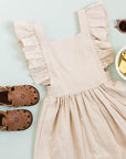 Adelisa & Co medium brown leather sandals for girls with floral detailing.