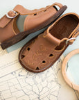 Adelisa & Co medium brown leather sandals for children. Unisex style.