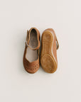 Adelisa & Co's handmade leather Cosecha Mary Janes for babies, kids and youth. These vintage style mary janes are crafted by artisans in Nicaragua and feature soft brown leather with a delicate leaf detail.