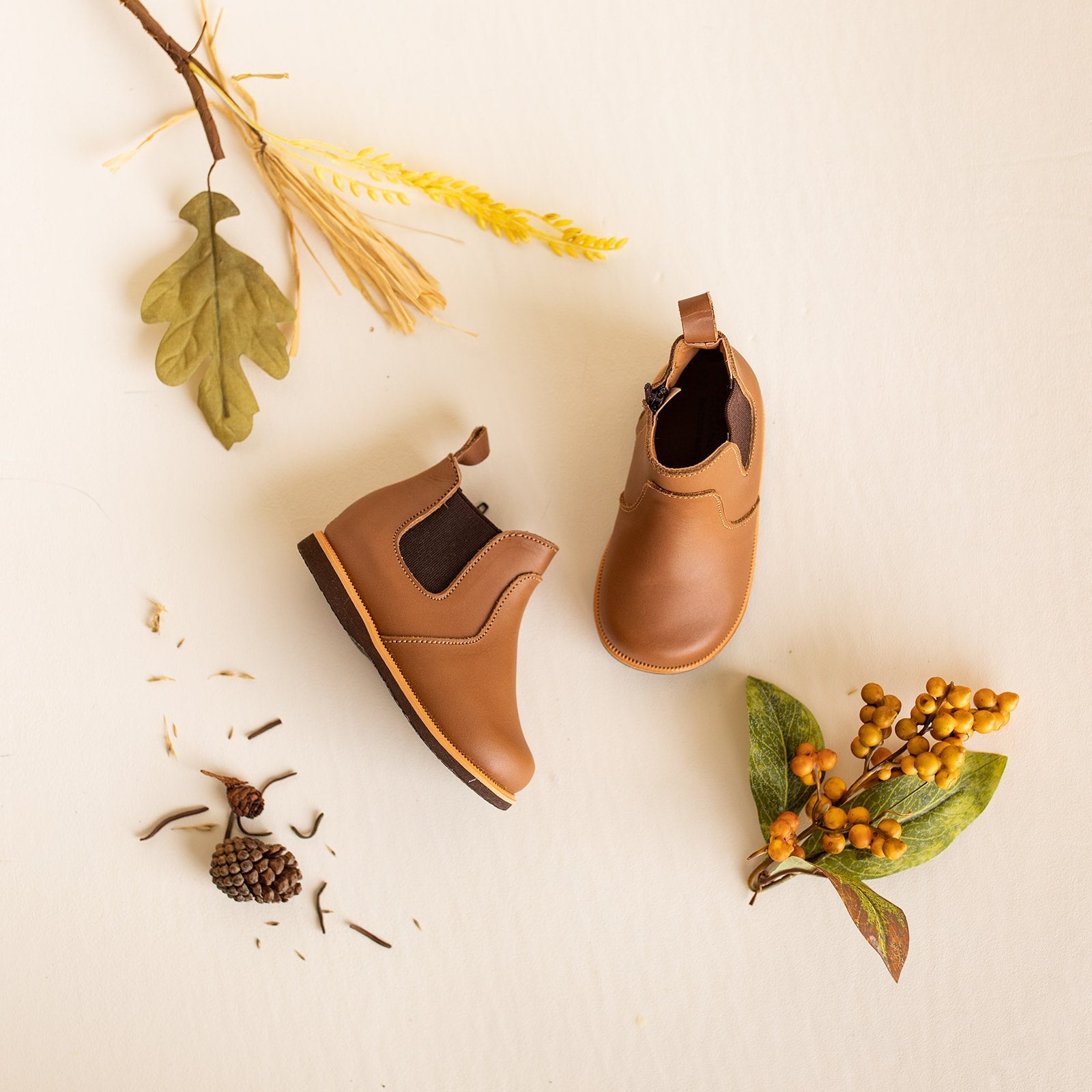 Adelisa &amp; Co kid&#39;s chelsea boot in medium brown leather. This unisex children&#39;s boot features an elastic side for slip on ease.