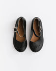 Adelisa & Co's handmade leather Cosecha mary janes for little girls with leaf detail.