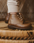 Adelisa & Co. Vintage style leather boots for children. Our Antigua leather boots come in a medium brown leather and feature a simplistic design with a round toe.