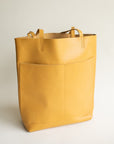 Adelisa & Co large mustard yellow leather tote for women.