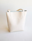 Adelisa & Co cream leather tote for children and women.