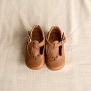 Soft sole infant brown leather Mary Jane with floral detailing.