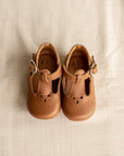 Soft sole infant brown leather Mary Jane with floral detailing.