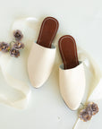 Cream leather women's mule shoe.