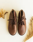 Dark brown leather boots for women.