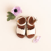 Cream leather sandals for girls with floral detailing