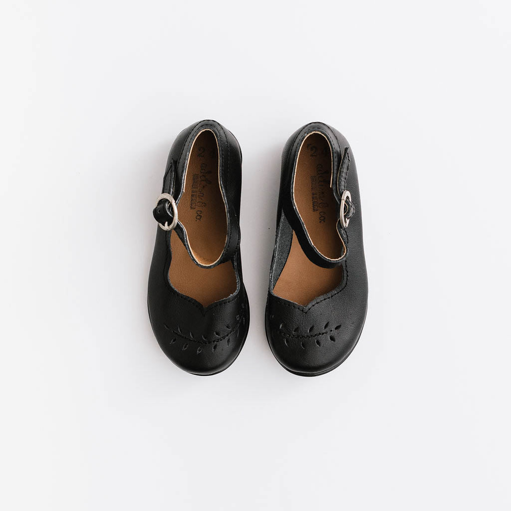 Adelisa &amp; Co&#39;s handmade leather Cosecha mary janes for little girls with leaf detail.