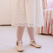 Cream leather Mary Jane shoes for girls.