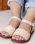 Cream leather sandals for girls with floral detailing